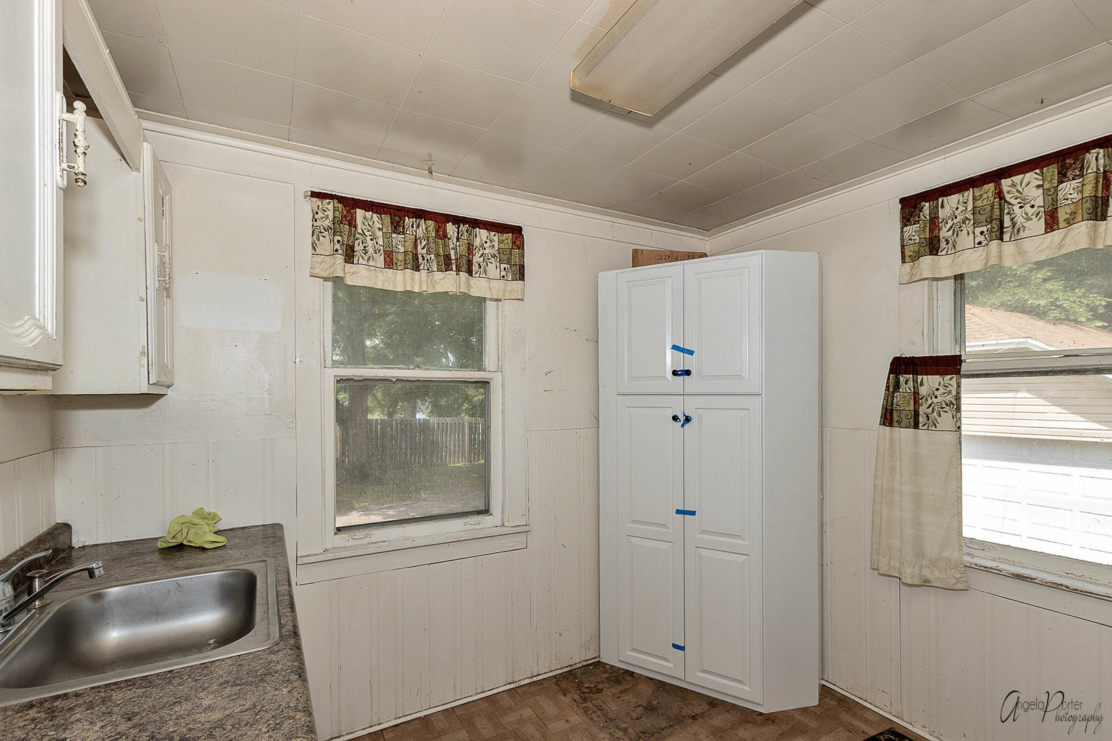 26308 West Rollins Road Ingleside, IL 60041 - Photo 13 of 26 a view of a hallway with a sink and a window