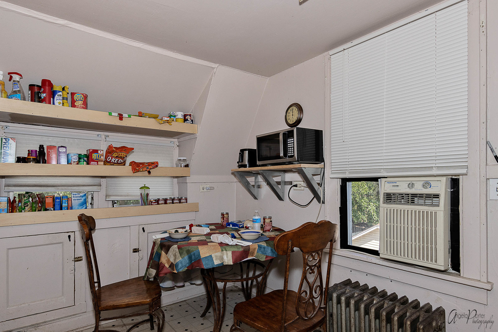 26308 West Rollins Road Ingleside, IL 60041 - Photo 18 of 26 a view of a dining room with furniture and a window