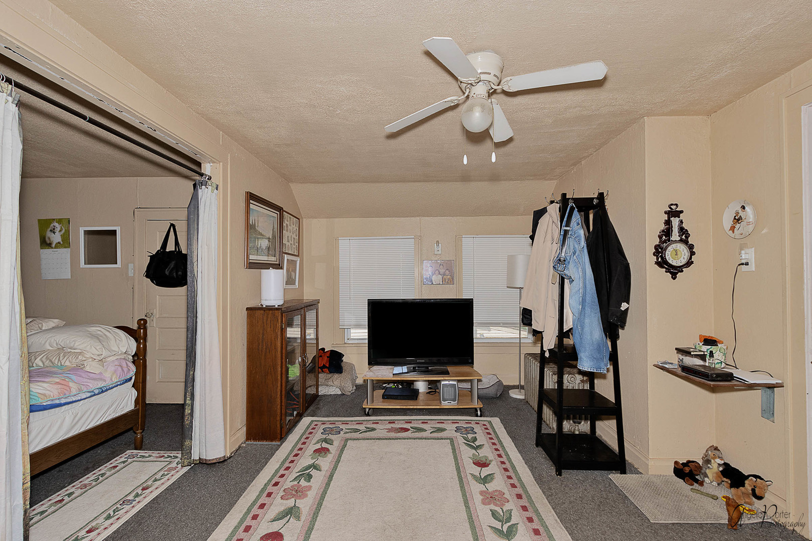 26308 West Rollins Road Ingleside, IL 60041 - Photo 21 of 26 a living room with furniture and a flat screen tv