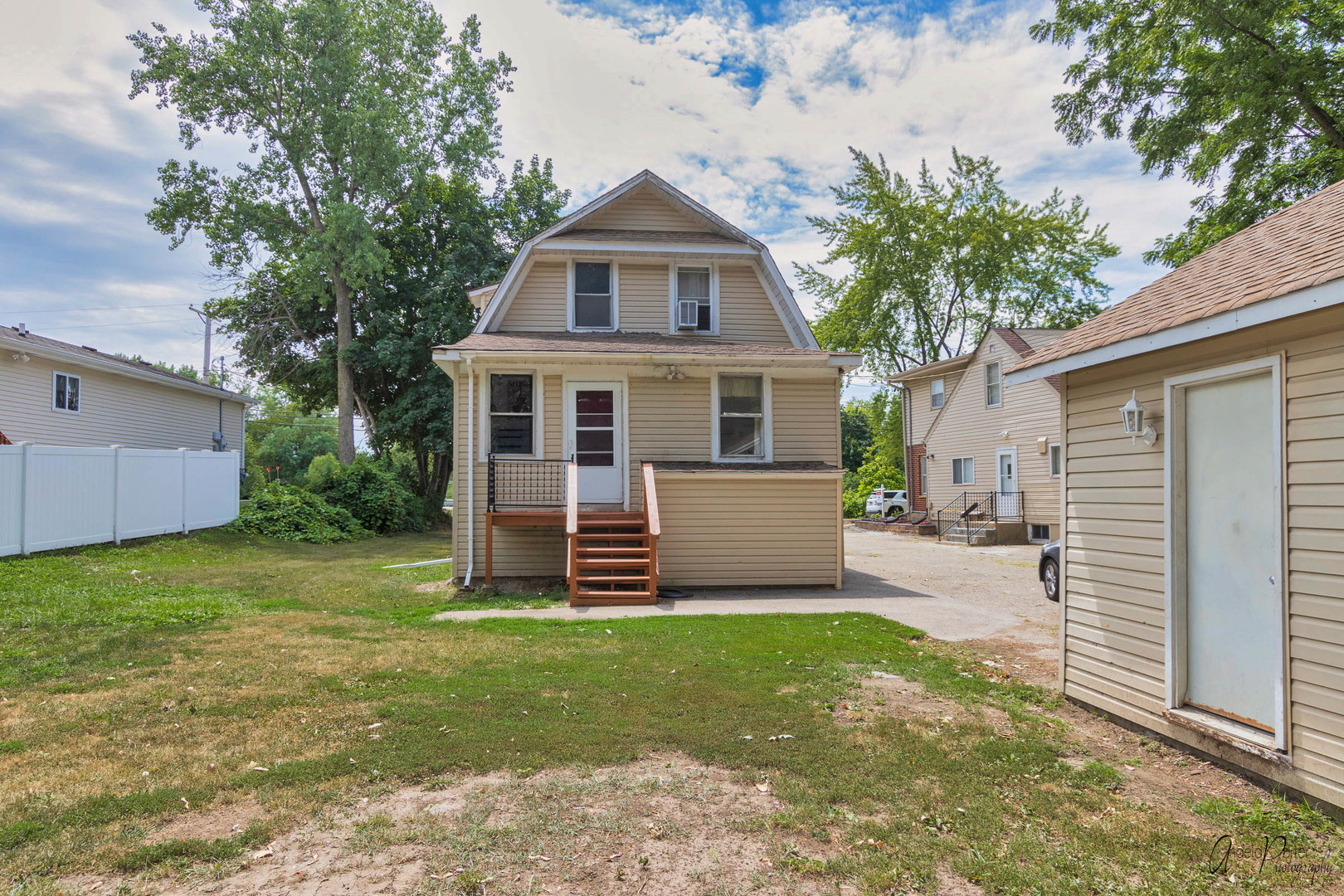26308 West Rollins Road Ingleside, IL 60041 - Photo 26 of 26 a front view of a house with a yard