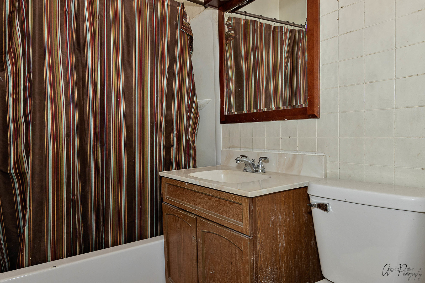 26308 West Rollins Road Ingleside, IL 60041 - Photo 8 of 26 a bathroom with a sink and a mirror