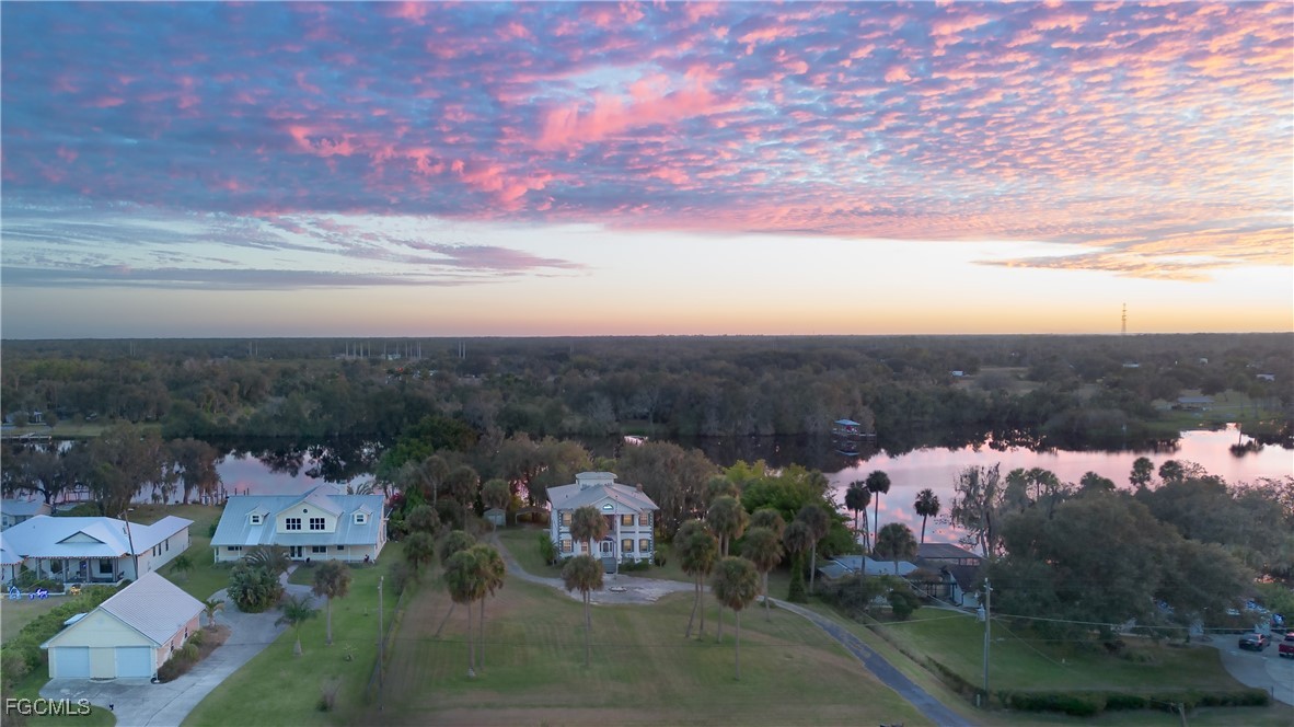21810 Pearl Street Alva, FL 33920 - Photo 2 of 50 an aerial view of a house with mountain view