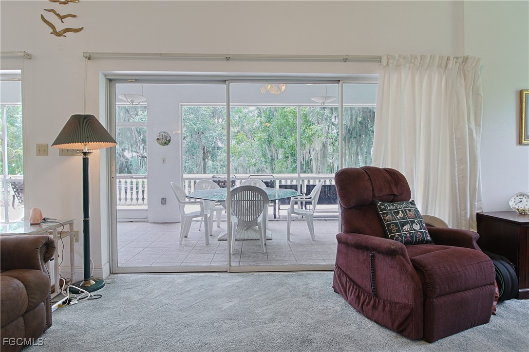 21810 Pearl Street Alva, FL 33920 - Photo 23 of 50 a living room with furniture and a window