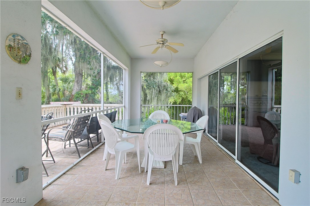 21810 Pearl Street Alva, FL 33920 - Photo 29 of 50 a view of a dining room with furniture window and outside view