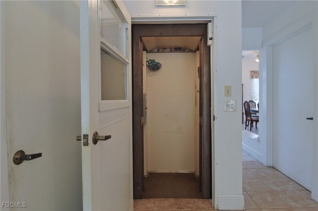 21810 Pearl Street Alva, FL 33920 - Photo 45 of 50 a view of a bathroom from a hallway