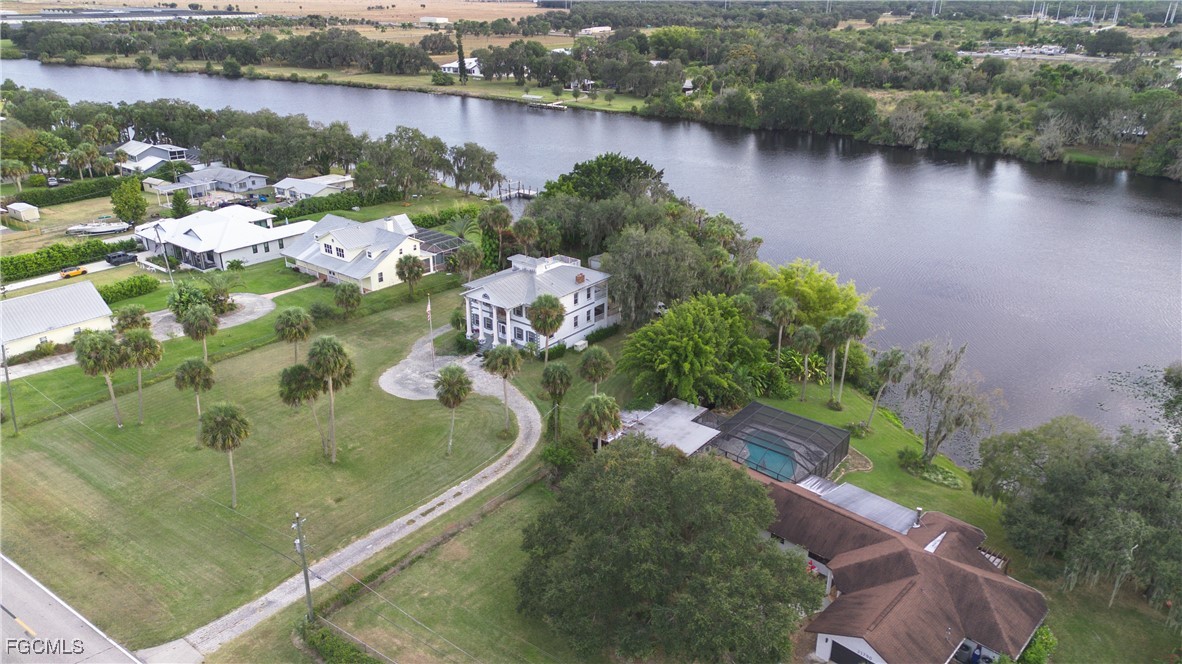 21810 Pearl Street Alva, FL 33920 - Photo 6 of 50 an aerial view of a house with outdoor space and lake view