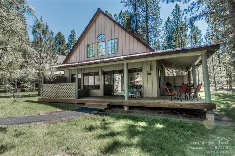 22 Circle 4 Ranch Circle Sunriver, OR 97707 - Photo 1 of 25 a view of house with yard