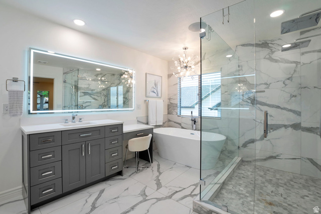 577 South Ridge Top Lane East North Salt Lake, UT 84054 - Photo 13 of 57 Luxury ensuite with striking marble-look tile, custom glass shower, and premium fixtures.