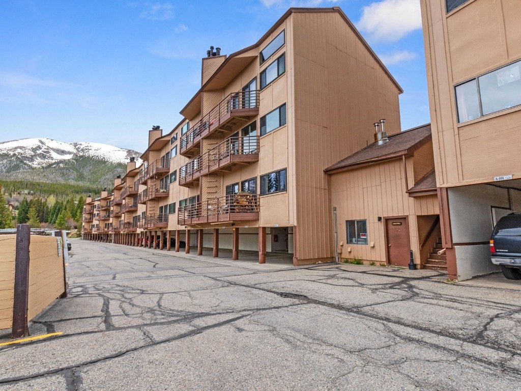 9825 Ryan Gulch Road, Unit B108 Silverthorne, CO 80498 - Photo 15 of 26 a view of a building with a street
