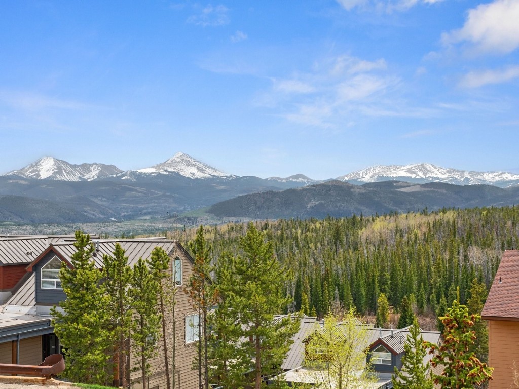 9825 Ryan Gulch Road, Unit B108 Silverthorne, CO 80498 - Photo 16 of 26 a view of a city and a mountain view