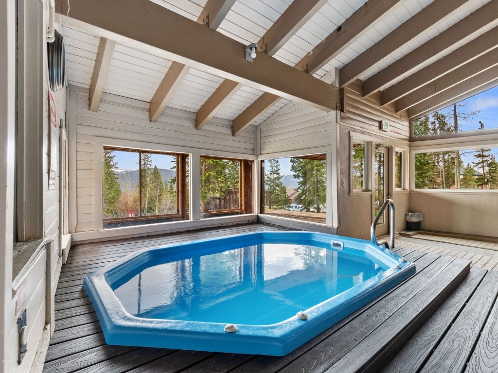9825 Ryan Gulch Road, Unit B108 Silverthorne, CO 80498 - Photo 22 of 26 a view of a jacuzzi and couch