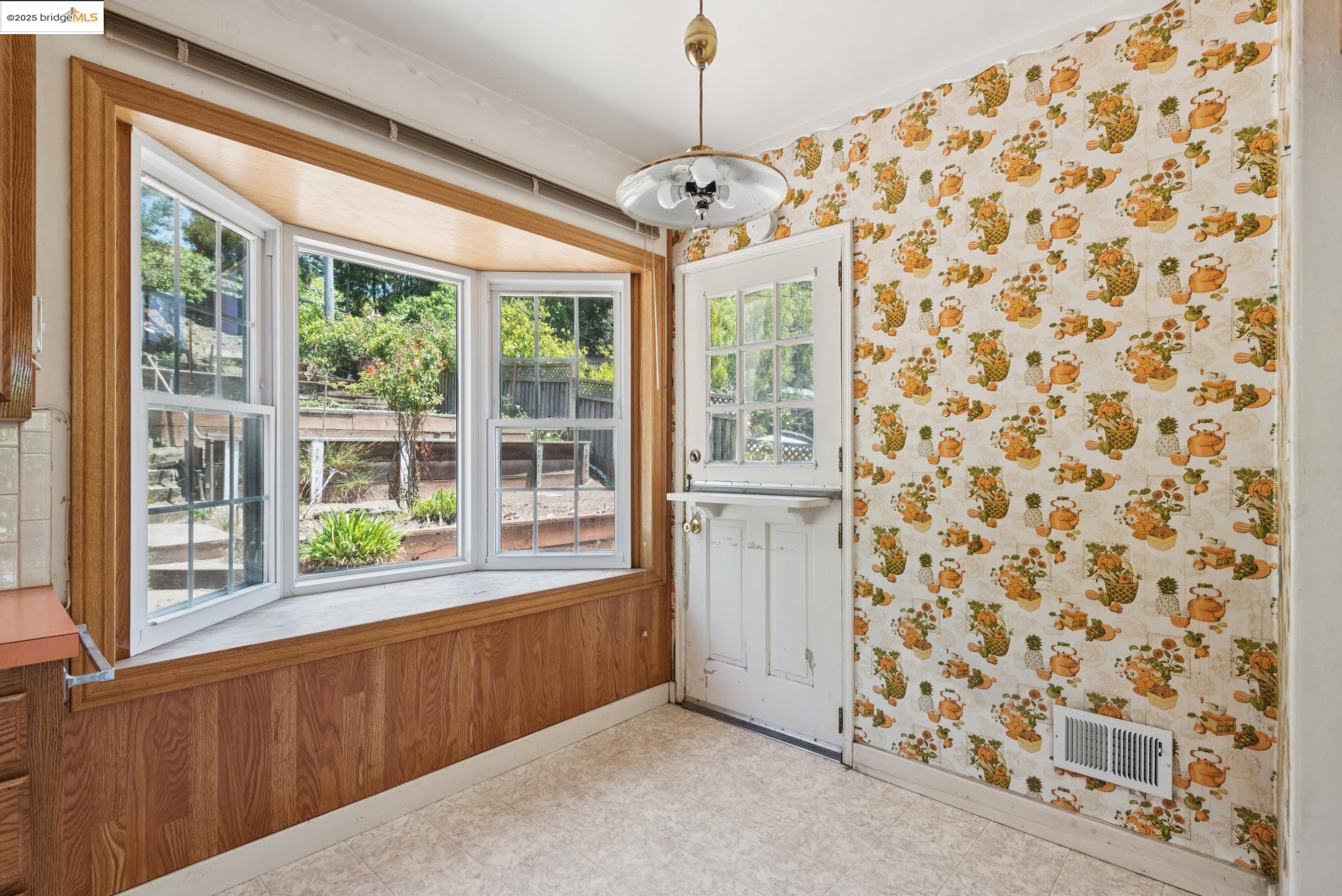 4751 Lincoln Avenue Oakland, CA 94602 - Photo 24 of 60 Doorway with wallpapered walls and tile patterned floors