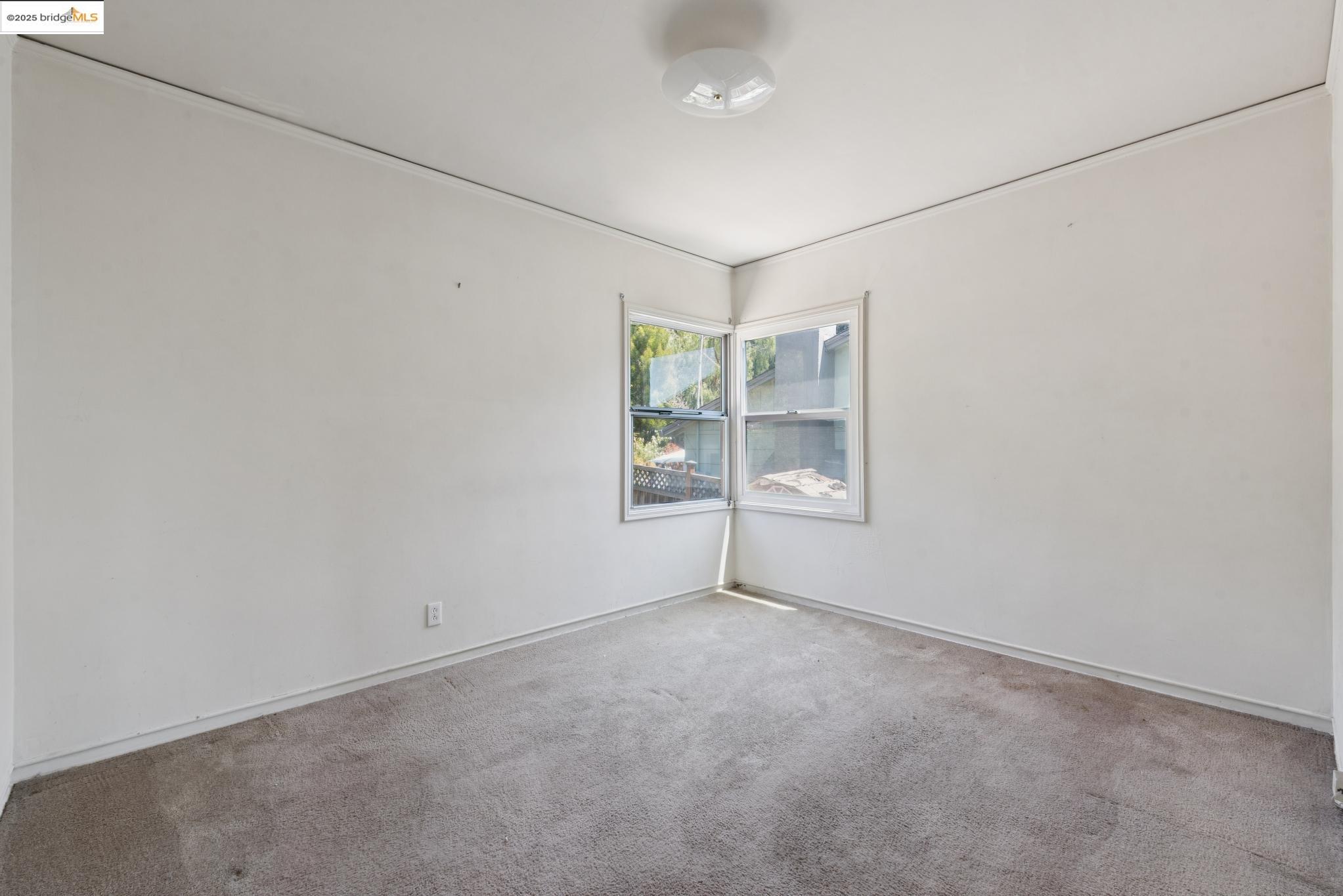 4751 Lincoln Avenue Oakland, CA 94602 - Photo 38 of 60 Unfurnished room with carpet and crown molding