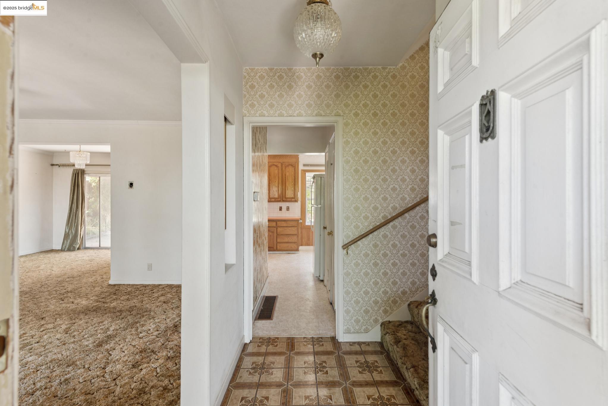 4751 Lincoln Avenue Oakland, CA 94602 - Photo 8 of 60 Hallway featuring crown molding and wallpapered walls