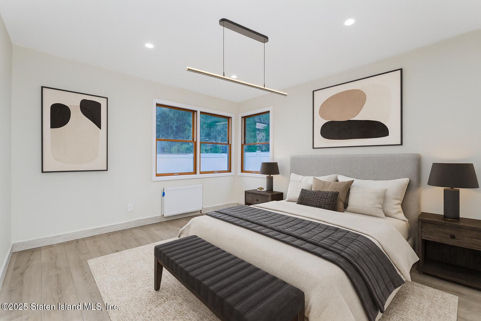 236 Amber Street Staten Island, NY 10306 - Photo 11 of 22 a bedroom with a large bed and a window