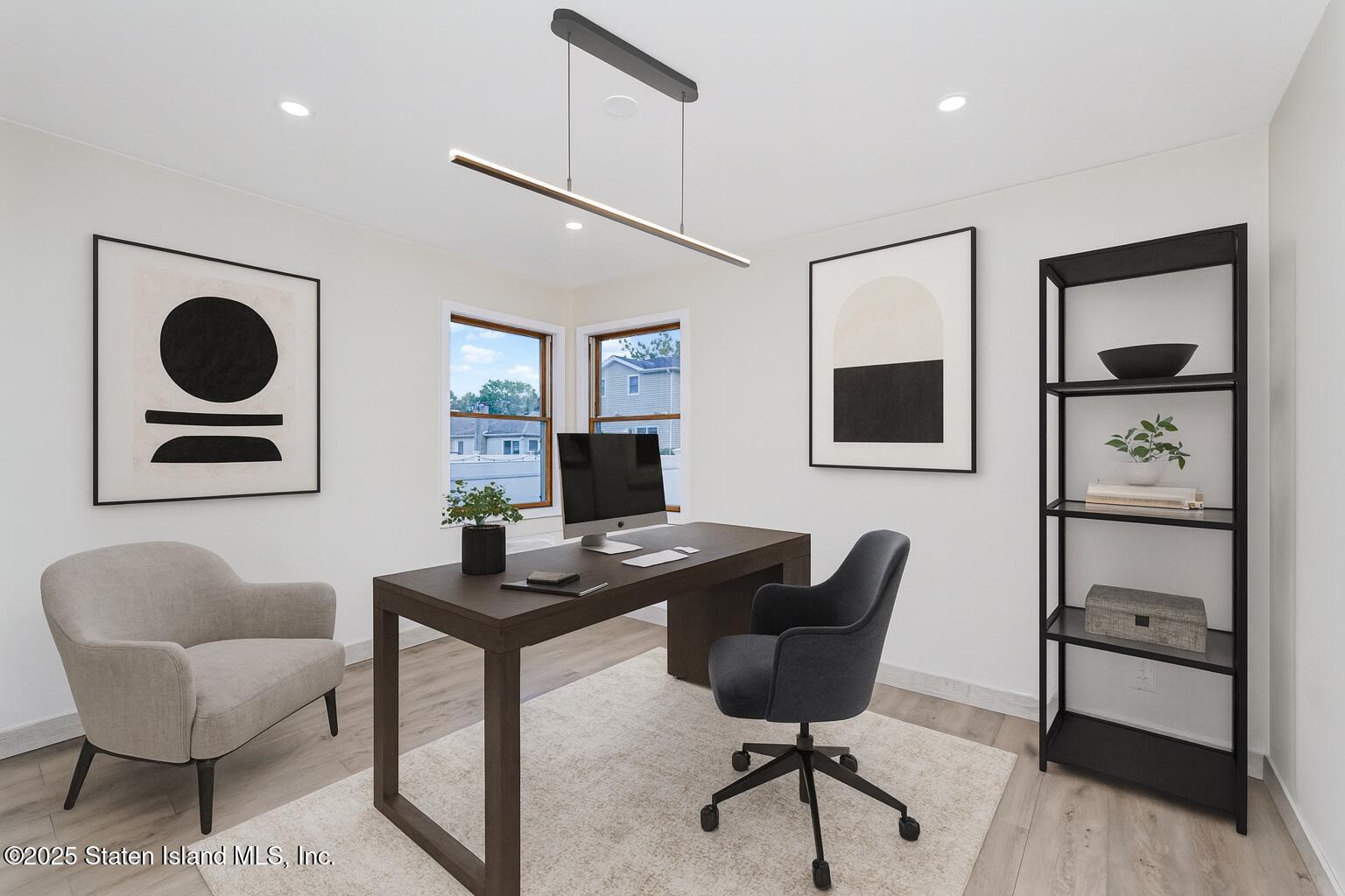 236 Amber Street Staten Island, NY 10306 - Photo 12 of 22 a work room with furniture and a wooden floor