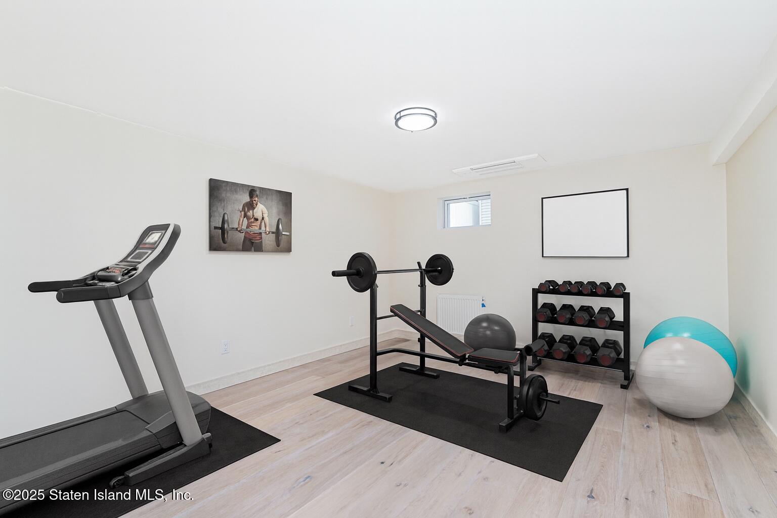 236 Amber Street Staten Island, NY 10306 - Photo 13 of 22 a view of a room with gym equipment