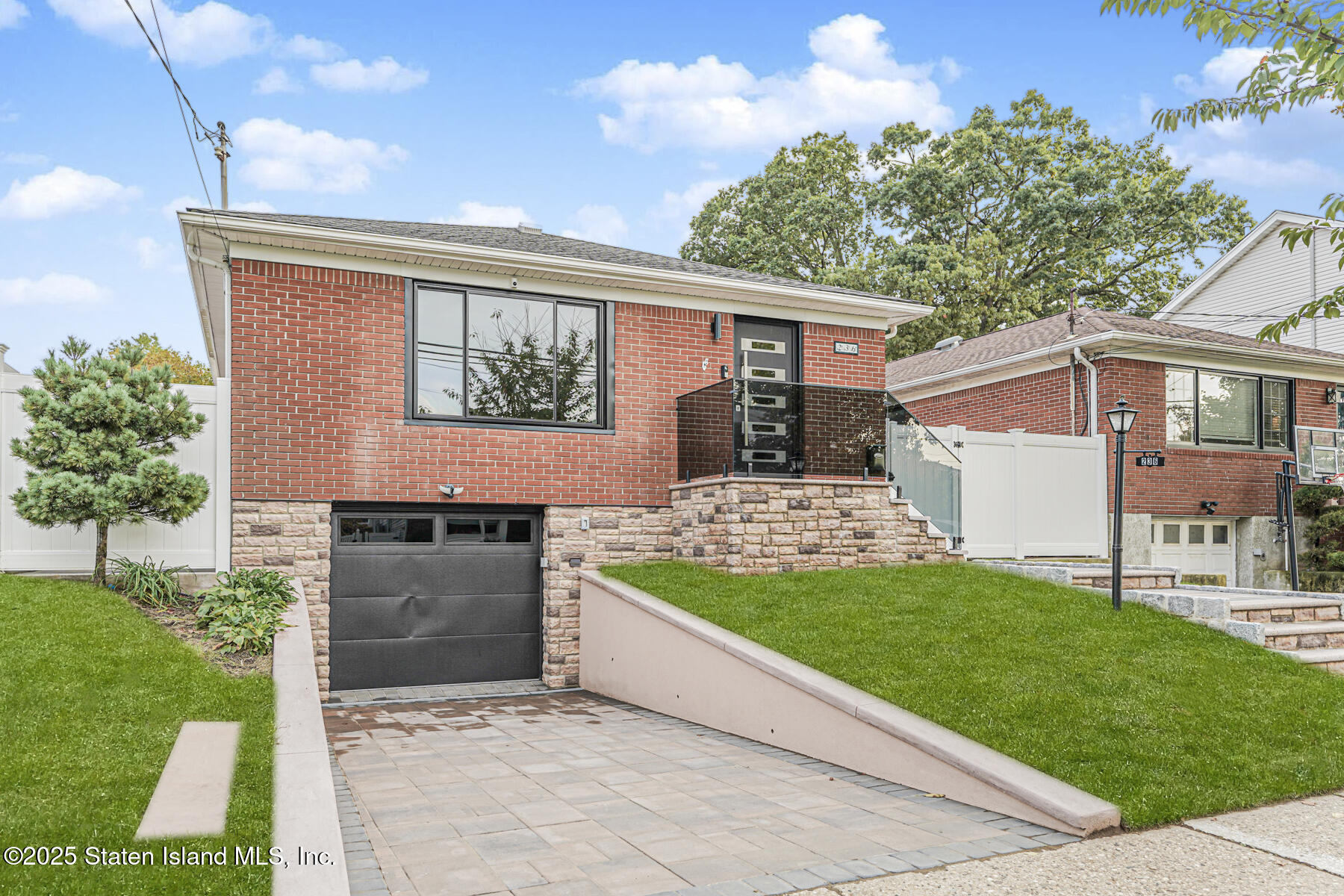 236 Amber Street Staten Island, NY 10306 - Photo 17 of 22 a front view of house with yard