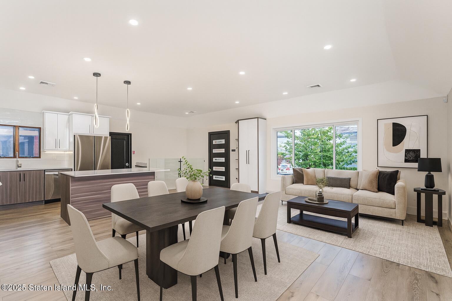236 Amber Street Staten Island, NY 10306 - Photo 2 of 22 a view of a dining room with furniture window and wooden floor