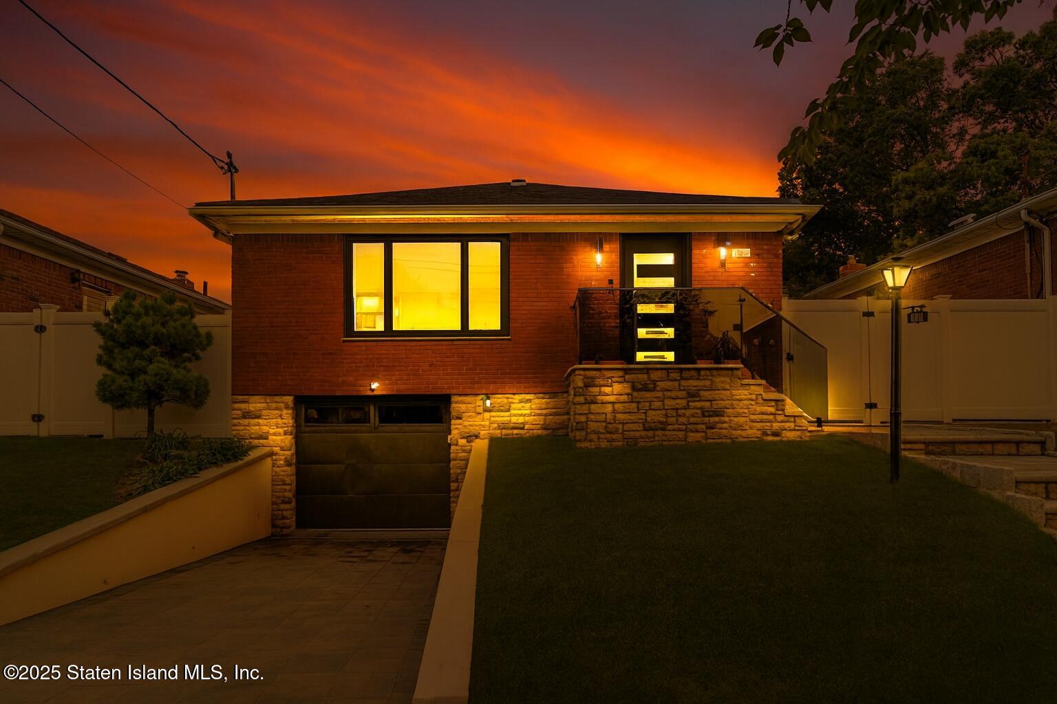 236 Amber Street Staten Island, NY 10306 - Photo 22 of 22 a front view of a house with a yard