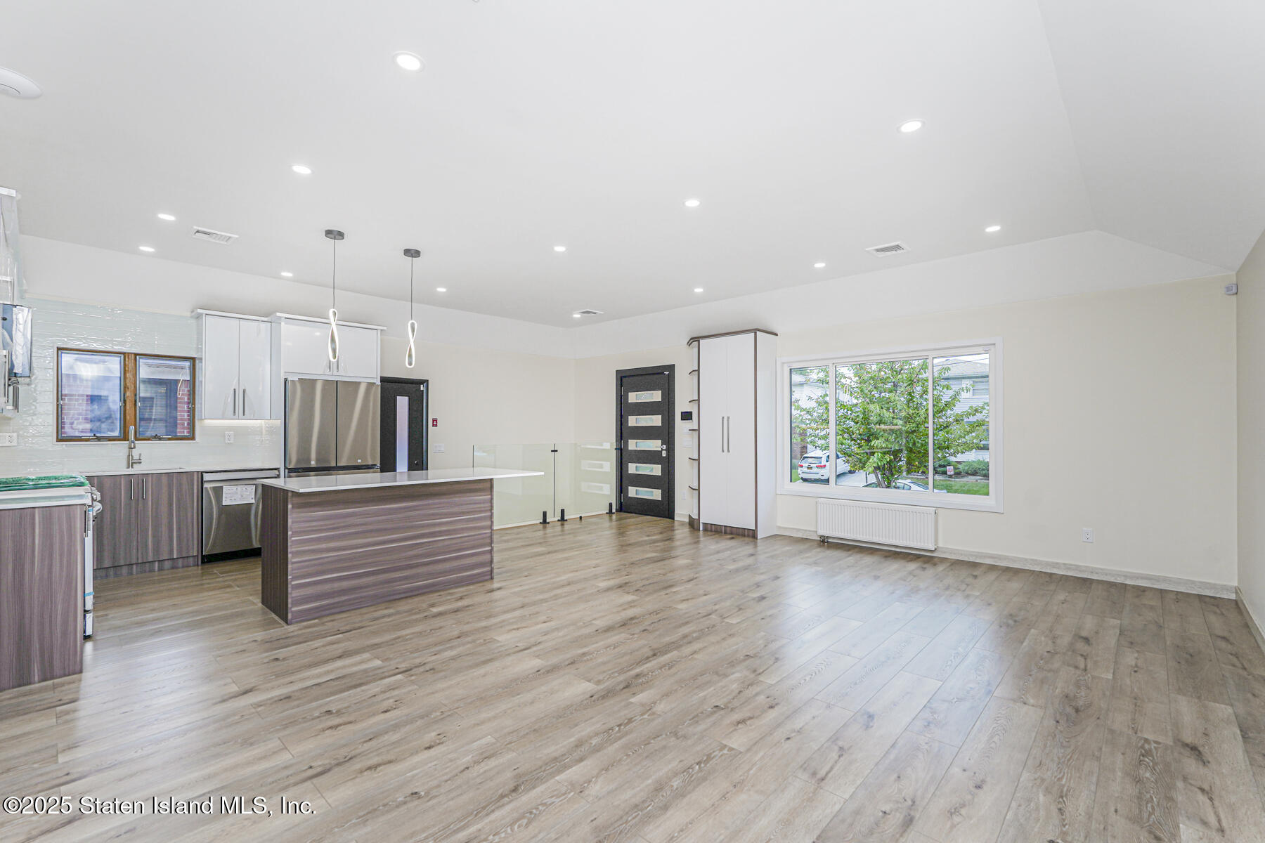 236 Amber Street Staten Island, NY 10306 - Photo 4 of 22 a view of kitchen with furniture and wooden floor