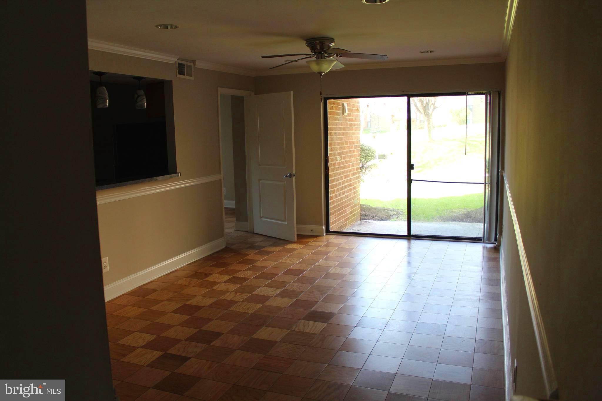 11204 Cherry Hill Road, Unit T2 Beltsville, MD 20705 - Photo 27 of 37 a view of an empty room and window