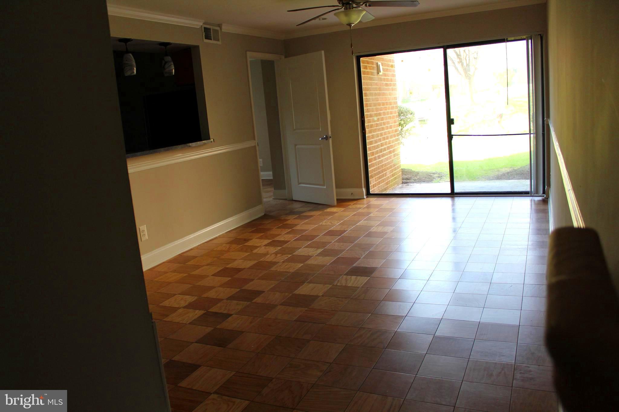 11204 Cherry Hill Road, Unit T2 Beltsville, MD 20705 - Photo 29 of 37 a view of an empty room with a window