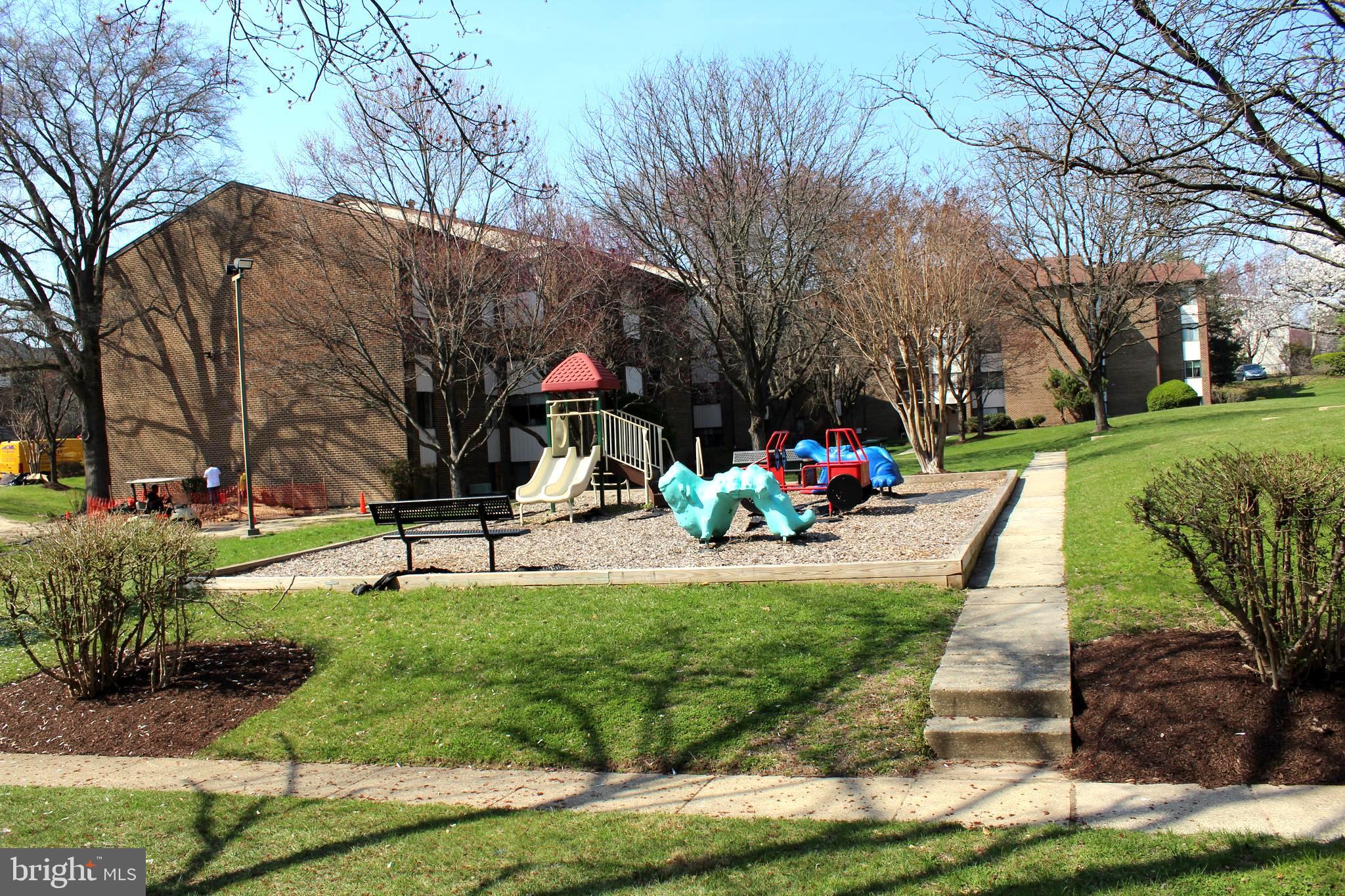11204 Cherry Hill Road, Unit T2 Beltsville, MD 20705 - Photo 33 of 37 a view of a park with large trees