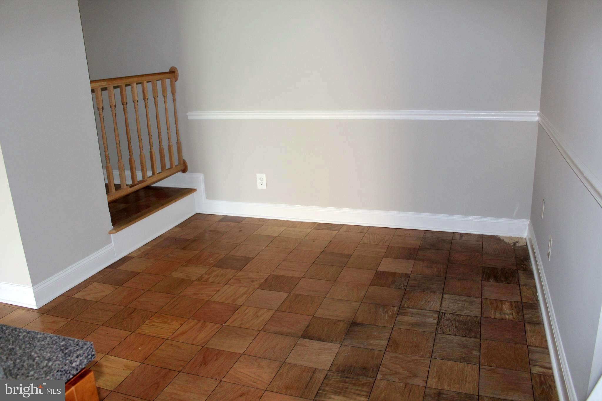 11204 Cherry Hill Road, Unit T2 Beltsville, MD 20705 - Photo 5 of 37 an empty room with wooden floor
