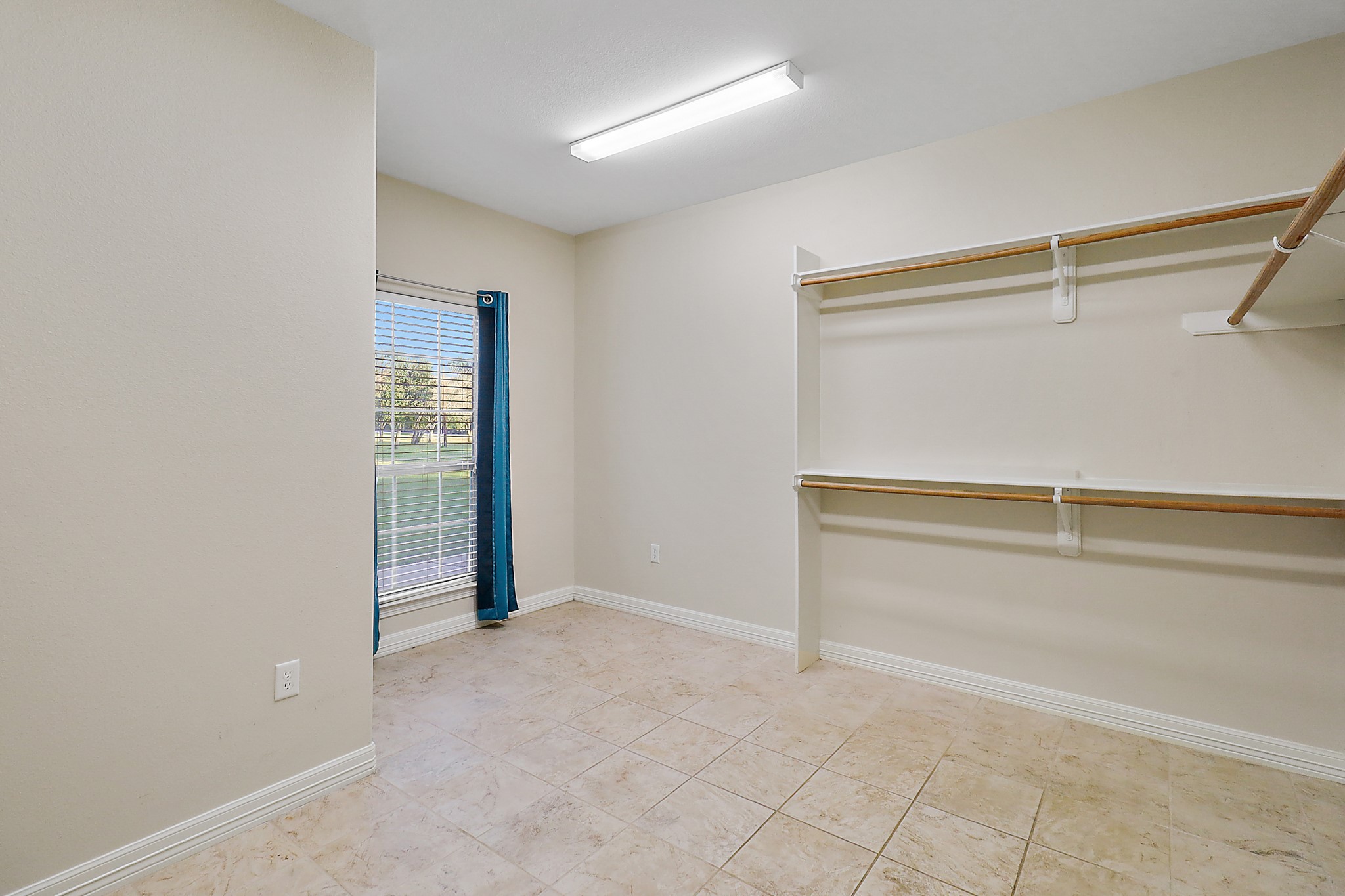 4521 West Bayshore Road, Unit A Anahuac, TX 77514 - Photo 14 of 34 wooden floor in an empty room