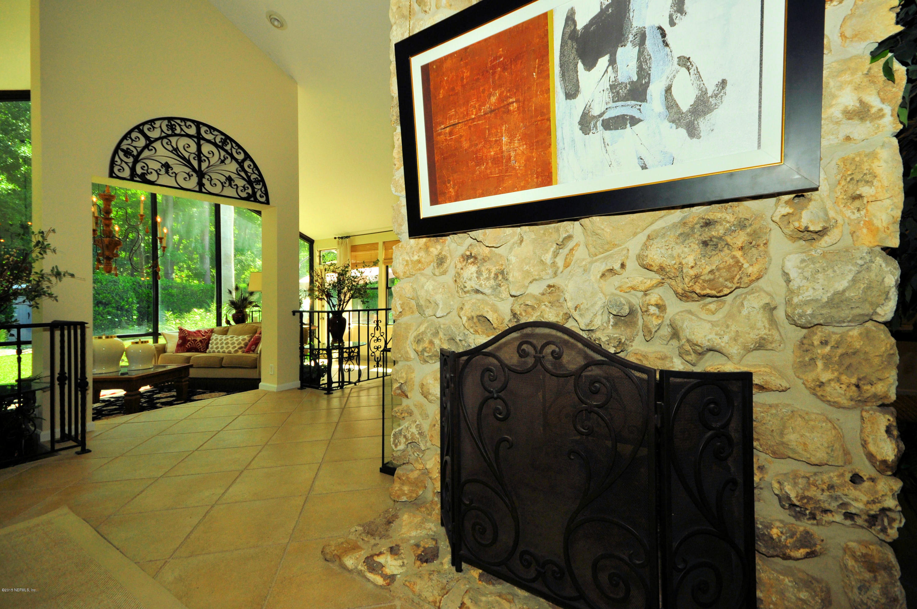 7737 Hunters Grove Road Jacksonville, FL 32256 - Photo 5 of 53 Fireplace in Dining Area