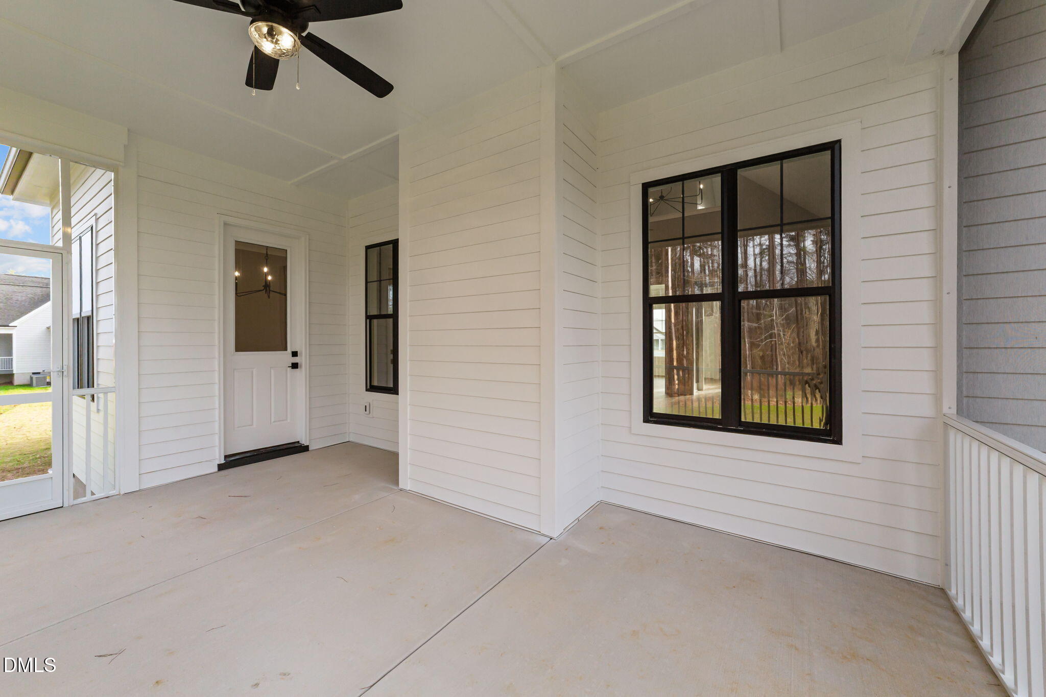 2590 Lassiter Road Four Oaks, NC 27524 - Photo 52 of 72 an empty room with windows
