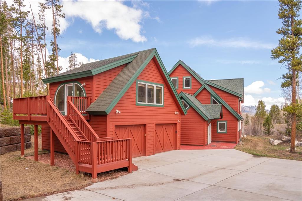 1202 Tiger Road Breckenridge, CO 80424 - Photo 2 of 35 a view of a house with a yard