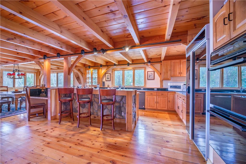 1202 Tiger Road Breckenridge, CO 80424 - Photo 4 of 35 a view of a room with lots of wooden furniture