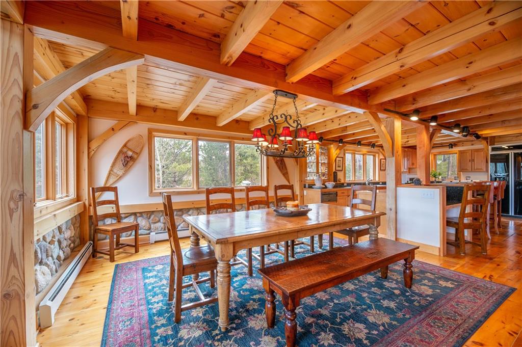 1202 Tiger Road Breckenridge, CO 80424 - Photo 7 of 35 a outdoor space with lots of furniture and wooden floor