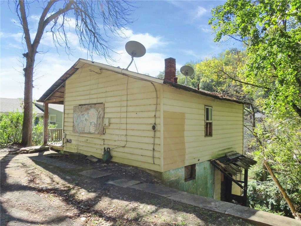 311 Run Street Carnegie, PA 15106 - Photo 2 of 20 a front view of a house with garden