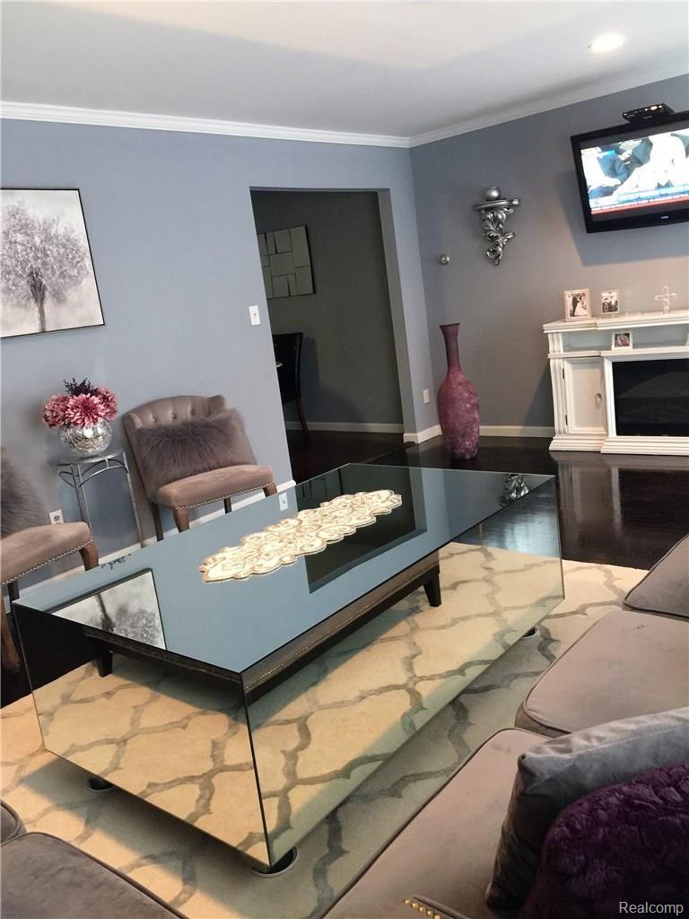 733 West Maple Road, Unit 17 Clawson, MI 48017 - Photo 2 of 13 Living Room.jpg