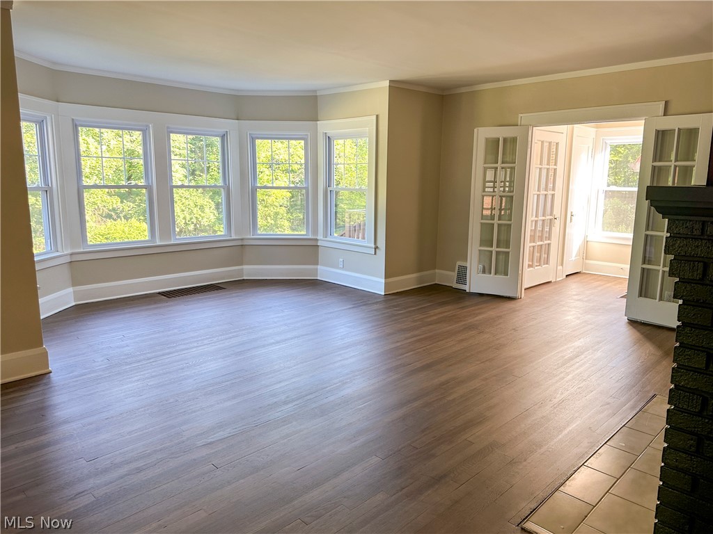 3079 Kiwatha Road Youngstown, OH 44511 - Photo 7 of 27 Living room with several windows and French doors