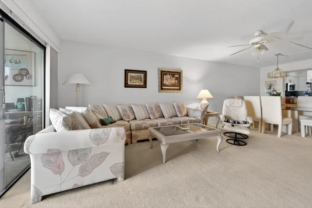 a spacious bedroom with a bed and a couch