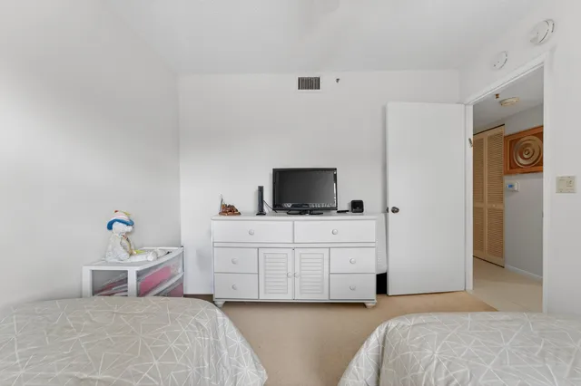 a bathroom with a sink vanity and a mirror