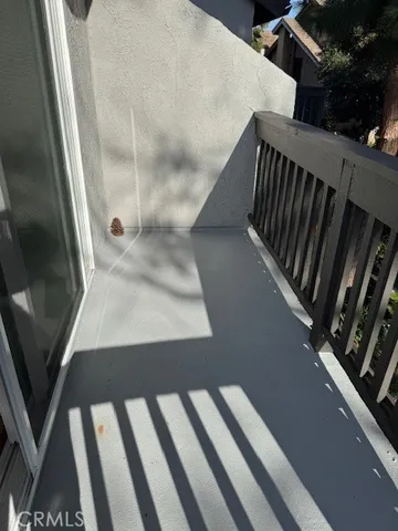 a view of a backyard with swimming pool