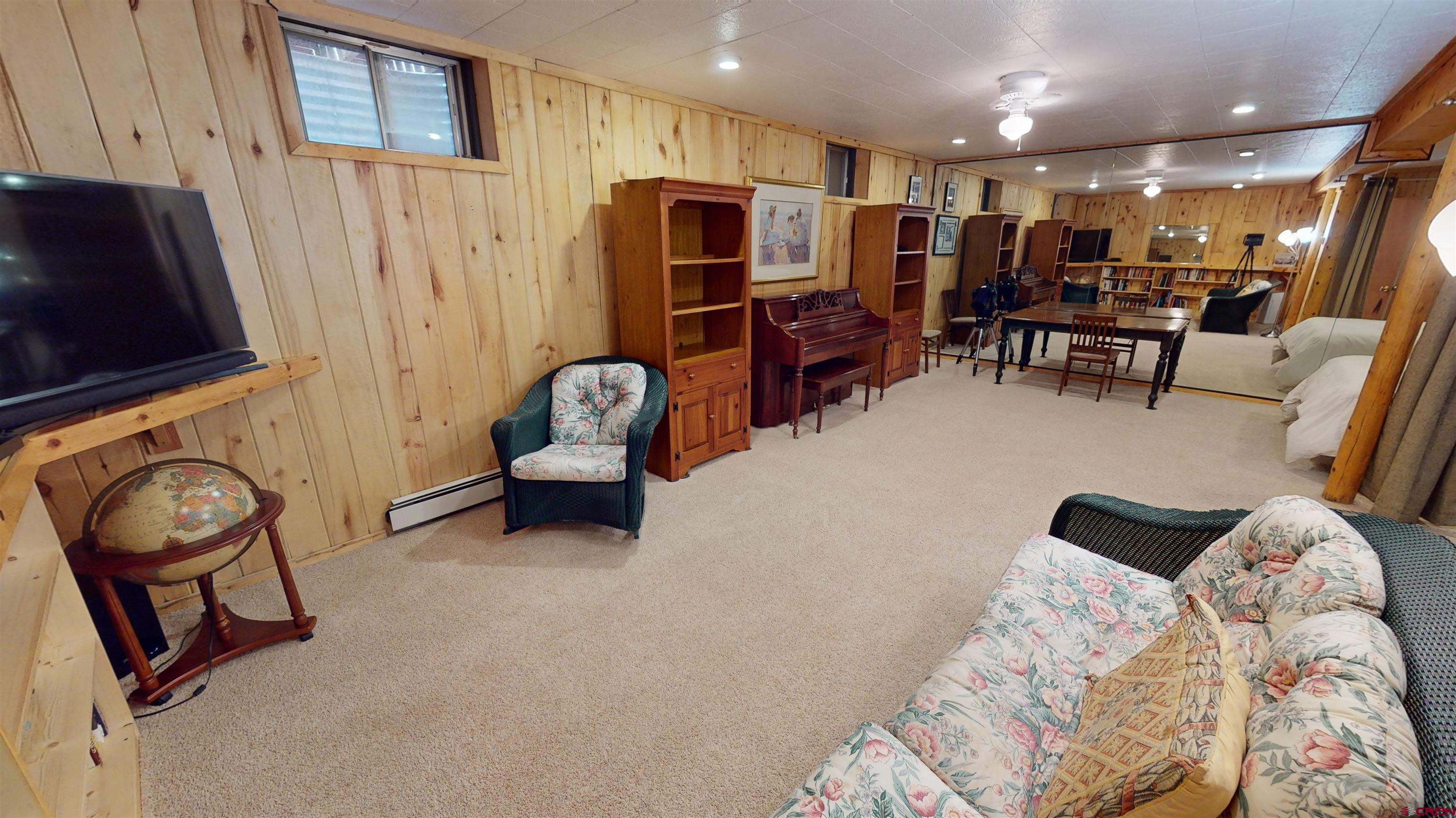 232 Pine Ridge Loop Durango, CO 81301 - Photo 26 of 35 a view of a livingroom with furniture and a flat screen tv