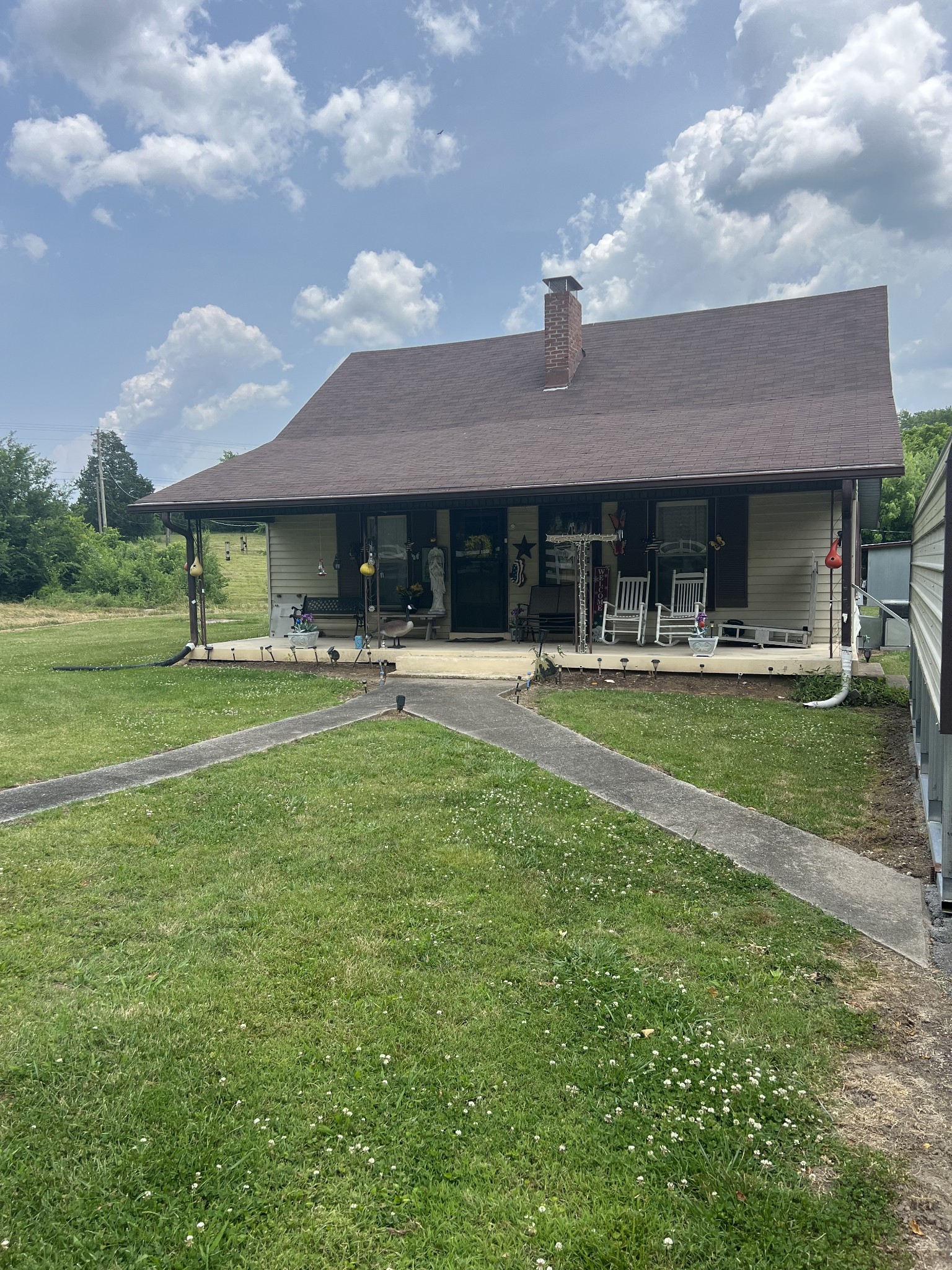 4629 Southeast Tater Peeler Road Lebanon, TN 37090 - Photo 6 of 11 a house view with swimming pool and porch