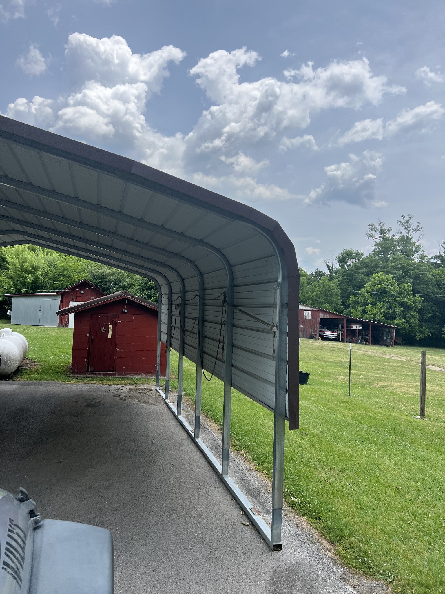 4629 Southeast Tater Peeler Road Lebanon, TN 37090 - Photo 8 of 11 a view of backyard with barbeque grill and a small yard