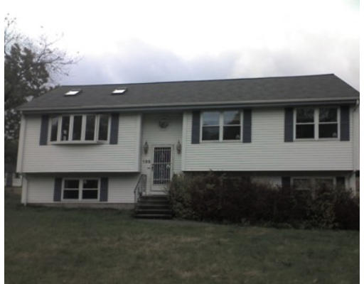 133 Allen Road Billerica, MA 01821 - Photo 1 of 1 a front view of a house with a yard
