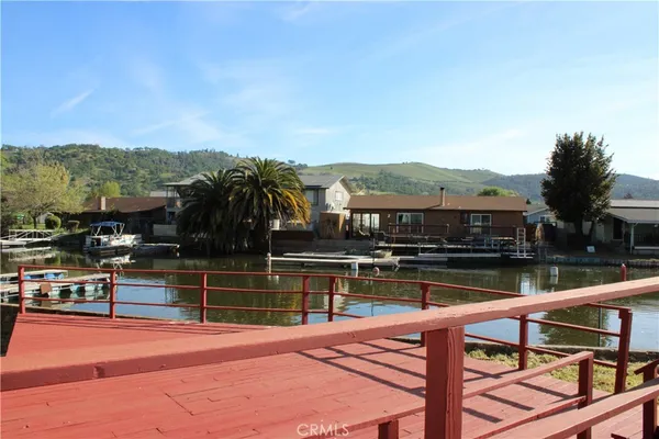 a view of a swimming pool with a lake view