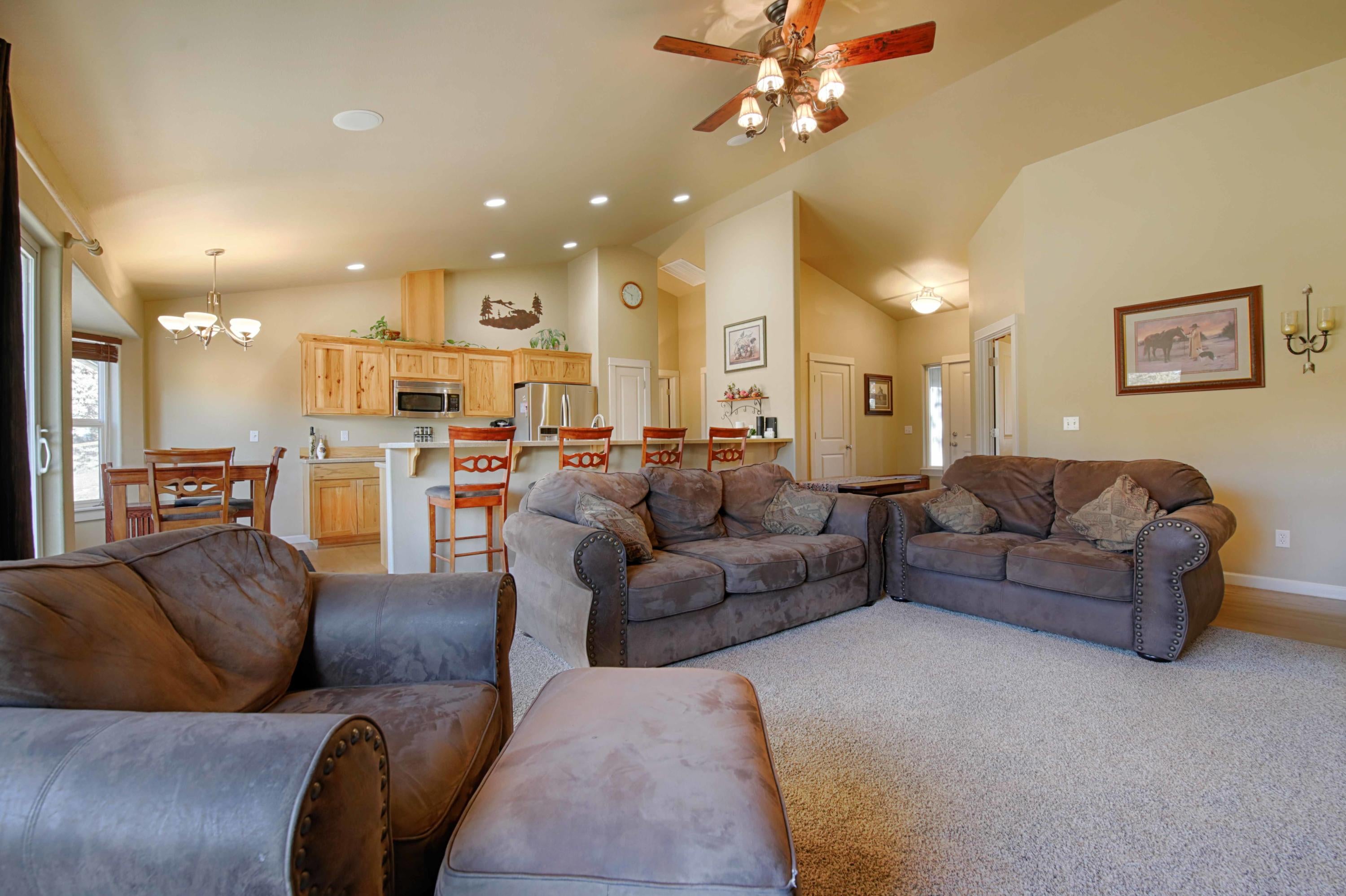 64818 Grande Loop Bend, OR 97701 - Photo 6 of 29 View of great room with vaulted ceilings.