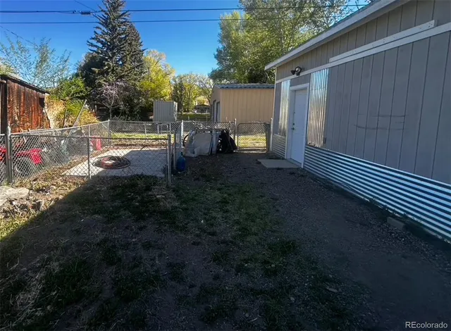 a view of backyard and porch