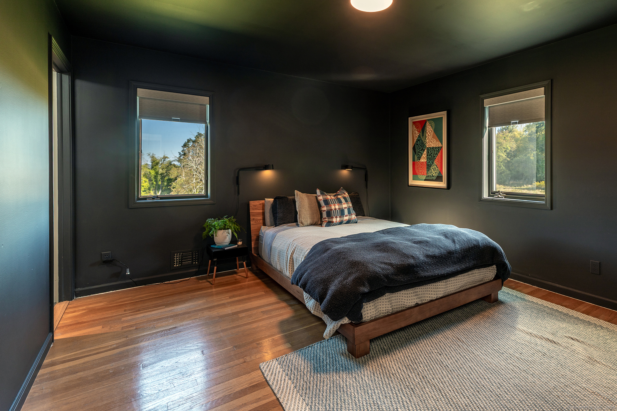 10 Surdan Mountain Road Sharon, CT 06069 - Photo 15 of 31 a bedroom with a bed lamp and a window