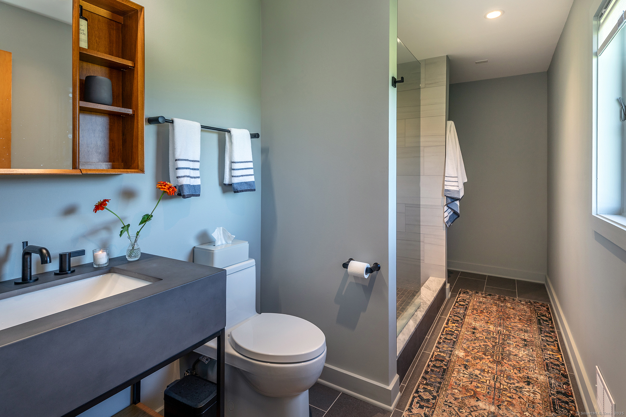 10 Surdan Mountain Road Sharon, CT 06069 - Photo 16 of 31 a bathroom with a sink toilet and shower